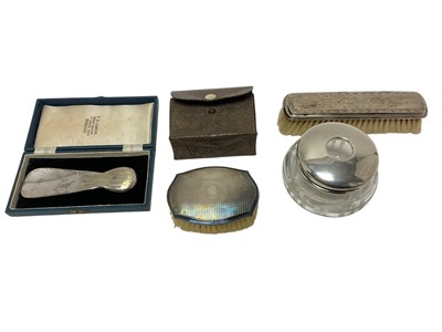 Lot 399 - Edwardian silver shoe horn, with engine turned decoration, in a case