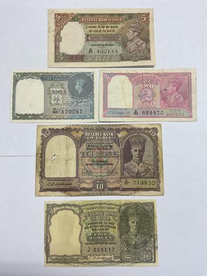 Lot 522 - India - British Raj Reserve Bank of India George VI mixed banknotes to include Obv: Facing bust types 10 Rupee C.D. Deshmukh 1943, blue-violet & olive (N.B. Holed) otherwise GF, 5 Rupee C.D....