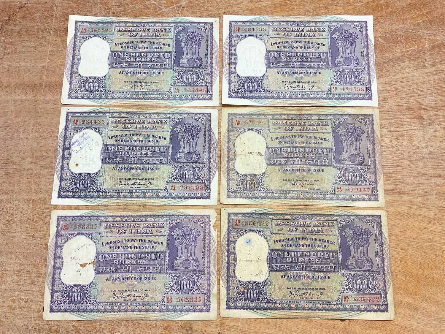Lot 419 - India - Republic Reserve Bank of India mixed 100 Rupee purple banknotes to include signatures: H.V.R. Iengar 1957-62 GVF-AEF, P.C. Bhattacharyya GEF & four other 100 Rupee notes in mixed gra...