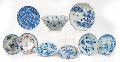 Lot 127 - Group of 17th and 18th century Chinese blue and white porcelain, including saucers, dishes, a bowl, and a box, some with shipwreck labels (9)