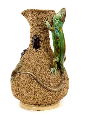 Lot 131 - A large Portuguese Palissy ware jug, with lizard handle, and applied insects, amphibians and reptiles, marked Mafra Caldas to base, 33cm high