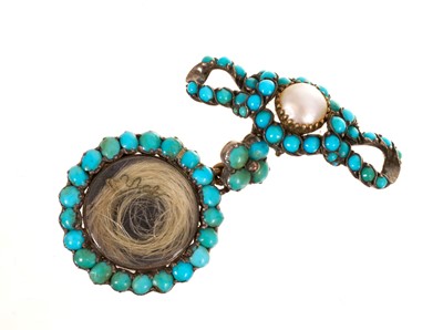 Lot 501 - 19th century turquoise and pearl pendant locket with a circular locket suspended from a bow brooch, the reverse with further compartment and inscription "H.R.H. Mary Duchess of Gloucester, 1857"...