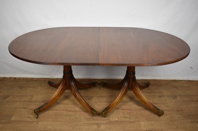 Lot 1630 - George III style mahogany twin pedestal dining table