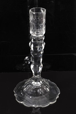 Lot 143 - A Georgian facet-cut glass candlestick, with baluster stem and ogee foot, rough pontil mark, 21cm high