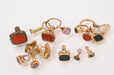 Lot 532 - A group of Regency and 19th century seals to include gold and gilt metal examples, Victorian gold signet ring with intaglio carved spider and web to the bloodstone bezel, etc.