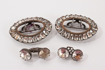 Lot 547 - Pair of George III paste-set buckles with foil-backed paste stones in white metal setting with steel fittings, 42mm, together with two Georgian silver and paste-set cufflinks