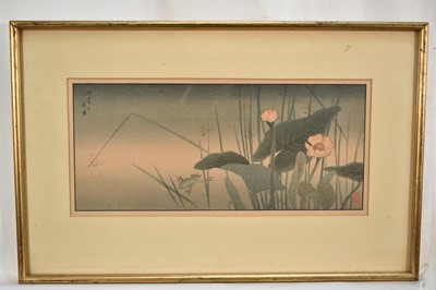 Lot 1370 - Japanese woodblock in the style of Ohara Koson - Frog leaping from a leaf, 16cm x 37cm, in glazed frame