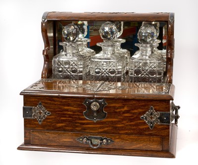 Lot 1122 - Edwardian oak and silver plate mounted tantalus
