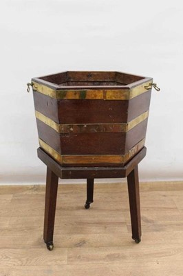 Lot 1683 - George III mahogany and brass bound hexagonal cellarette on stand