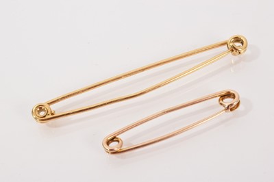 Lot 712 - 18ct gold tie pin and one other yellow metal tie pin (20