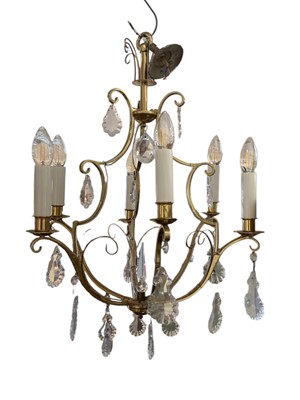 Lot 808 - Gilt brass six branch electrolier with glass prismatic drops 59cm high, and another glass ceiling light fitting (2)