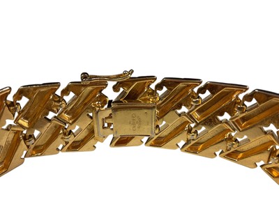 Lot 6 - Vintage Christian Dior gilt metal bracelet with cross design links, 19cm long