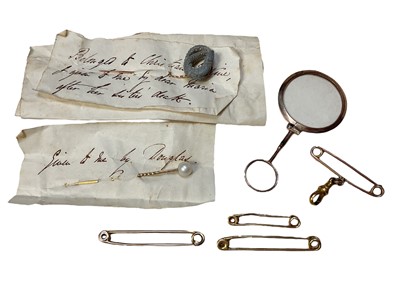 Lot 8 - Two 18ct gold and two yellow metal tie pins, yellow metal mounted magnifying glass and two stick pins
