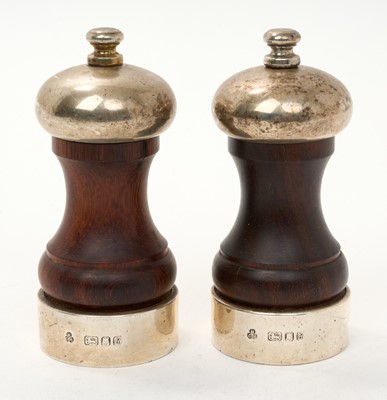 Lot 454 - Pair contemporary silver mounted salt and pepper mills, of capstan form (London 1991) M C Hersey & Son Ltd. 10.5cm overall height.