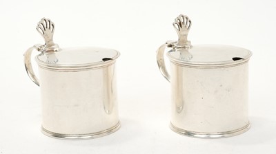 Lot 457 - Pair Early George V silver drum mustards, with scroll handles, pierced thumb pieces