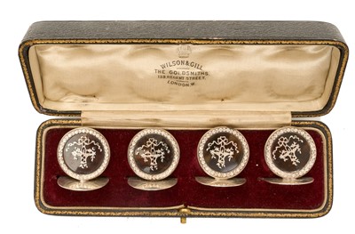 Lot 459 - Set of four silver mounted tortoiseshell menu holders of circular form, on circular silver bases