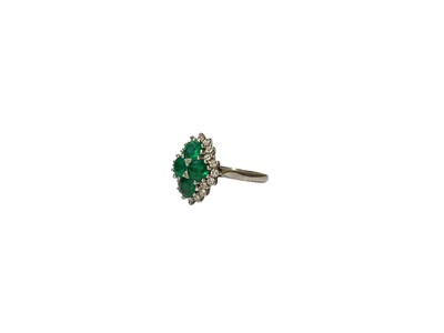 Lot 15 - 1970s emerald and diamond cluster ring