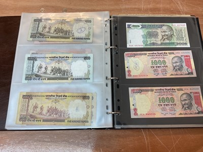 Lot 422 - India - An album containing predominately Republic Bank of India mixed banknotes to include consecutively numbered issues in uncirculated condition, Burma Military issues of George VI, Bank of B...