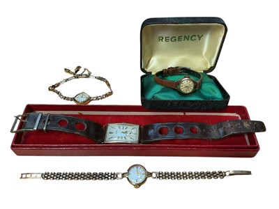 Lot 21 - Three vintage 9ct gold cased ladies' wristwatches and Audax 9ct gold cased gentlemen's watch on leather strap (4)