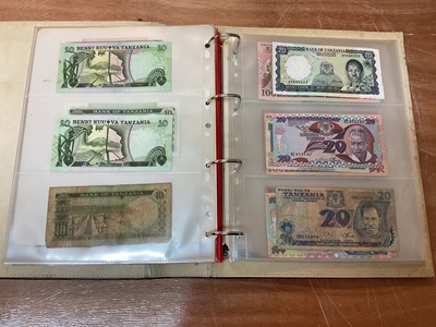 Lot 424 - East Africa - An album containing mixed banknotes with scarcer issues notes (N.B. Mixed grades) (120 banknotes)