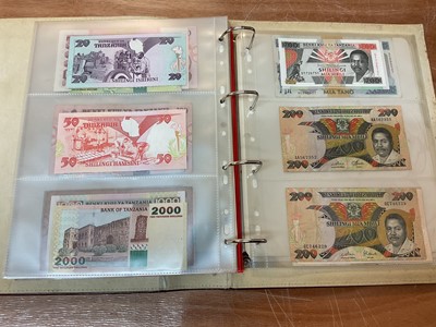 Lot 424 - East Africa - An album containing mixed banknotes with scarcer issues notes (N.B. Mixed grades) (120 banknotes)