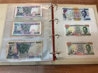 Lot 424 - East Africa - An album containing mixed banknotes with scarcer issues notes (N.B. Mixed grades) (120 banknotes)
