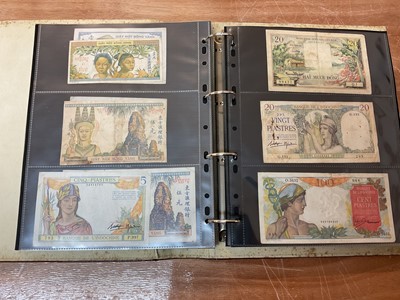 Lot 425 - World - An album containing Laos, Vietnam, Nepal etc. mixed banknotes with scarcer issues noted (N.B. Mixed grades) (243 banknotes)