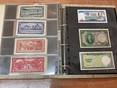 Lot 425 - World - An album containing Laos, Vietnam, Nepal etc. mixed banknotes with scarcer issues noted (N.B. Mixed grades) (243 banknotes)
