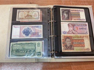 Lot 523 - World - An album containing Burma, Myanmar, Cuba etc. mixed banknotes (N.B. Mixed grades) (Qty)