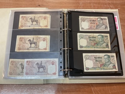 Lot 426 - World - An album containing Burma, Myanmar, Cuba etc. mixed banknotes (N.B. Mixed grades) (Qty)