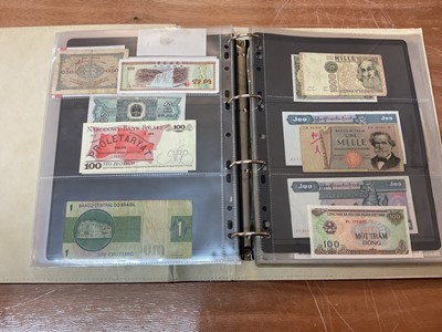 Lot 426 - World - An album containing Burma, Myanmar, Cuba etc. mixed banknotes (N.B. Mixed grades) (Qty)