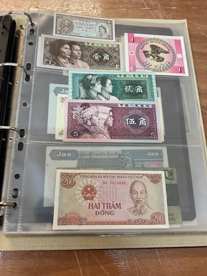 Lot 426 - World - An album containing Burma, Myanmar, Cuba etc. mixed banknotes (N.B. Mixed grades) (Qty)