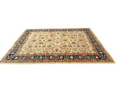 Lot 1741 - Large good quality Afghan rug with floral design on blue and cream ground, 325cm x 238