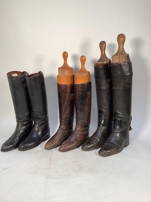 Lot 1193 - Three pairs of vintage black leather hunting boots including Maxwell, one pair with wooden Tom Hill trees