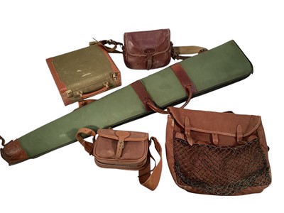Lot 1196 - William Powell cartridge magazine, leather cartridge bag, canvas example, gun case and a game bag (5)