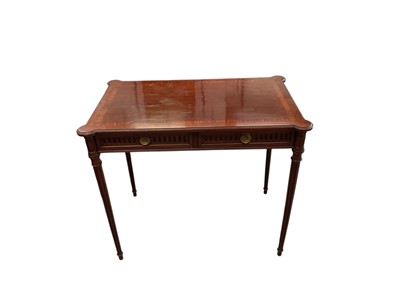 Lot 1717 - Late 19th century plum pudding mahogany two drawer writing table