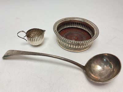 Lot 248 - Georgian silver wine coaster, Victorian silver ladle and small silver cream jug
