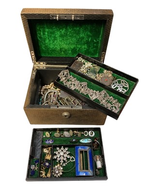 Lot 105 - Jewellery box containing a silver and blue enamel buckle, paste set brooches, white metal figural panel necklace, various gilt metal charms