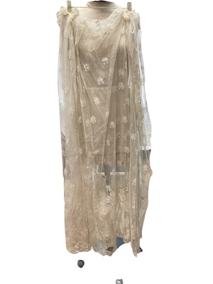 Lot 2054 - 19th century Limerick needle-run net lace ungathered skirt in a design of scrolling flowers and sprays of flowers.
