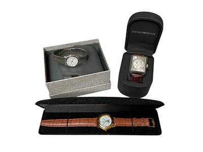 Lot 154 - Ebel stainless steel wristwatch, Emporio Armani Meccanico wristwatch on brown leather strap and one other wristwatch, all boxed (3)