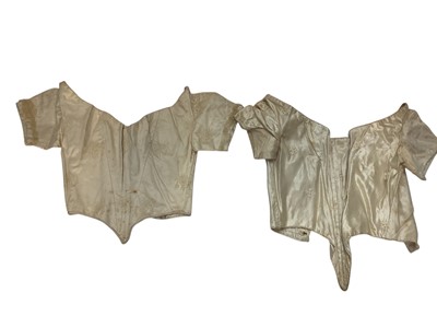 Lot 2056 - Box containing two Victorian embroidered net lace wedding bodices pointed at waistline, Mechlin lace fichu, one other lace fichu and a Honiton lace collar.