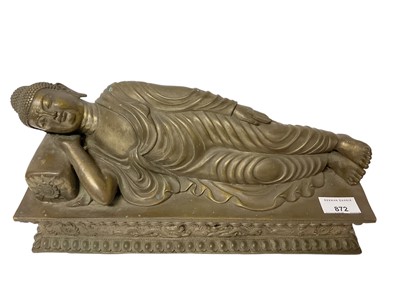 Lot 872 - Eastern bronze reclining buddha