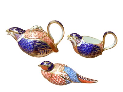 Lot 1110 - Royal Crown Derby Imari pattern teapot in the form of a quail, 13cm high, together with a matching milk jug, 10cm high and a paperweight (3)