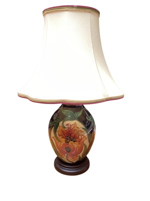 Lot 1132 - Moorcroft pottery table lamp decorated in the Fire Flower pattern, 22.5cm excluding brass fitting