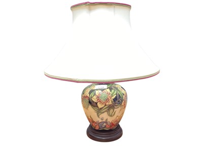 Lot 1150 - Moorcroft pottery table lamp with floral decoration, 19cm high excluding brass fitting