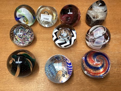 Lot 1152 - Ten Caithness paperweights including Cauldron, Acrobat and Momentum