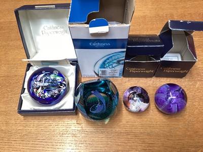 Lot 1162 - Collection of various paperweights to include four Caithness (boxed), Langham, some with millefiori decoration, together with a pair of Orrefors candlesticks (17 items in total)