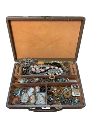 Lot 140 - Jewellery case containing various cameos, Victorian gilt metal and enamel oval glazed locket, vintage bead necklaces, gilt metal chains