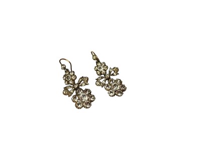 Lot 131 - Victorian style paste earrings with two flower head clusters and bow decoration