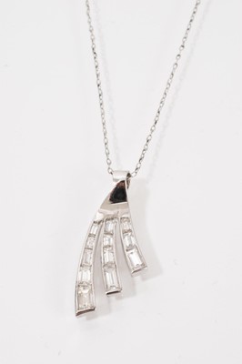 Lot 649 - Art Deco style diamond pendant with tapered baguette cut diamonds in white gold setting on chain